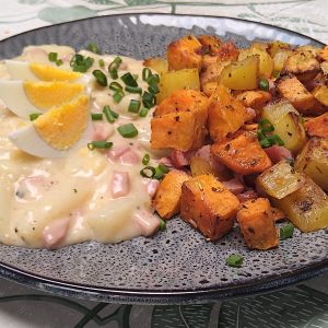 Asperges met ham in lichte kaassaus met ovengebakken aardappel - receptenwijzer.be